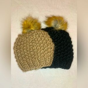 2 knitted beanies with puff